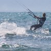 Thumb Picture: Kitesurferin tanzt über die Wellen in der Bucht von Pollensa