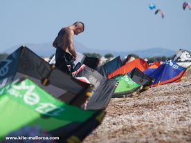 Kites arranged in proper order on the ground and in the air The kites make the beaches colourful