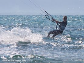 Kitesurfer playing in small waves A very nice ride...