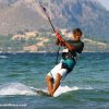 Thumb Picture: Daniel kitesurfing on his kiteboard over the waves